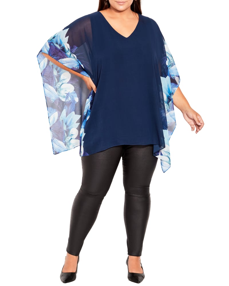 Front of a model wearing a size 14 Bella Overlay Top in White / Light Blue by Ave Studio. | dia_product_style_image_id:215496